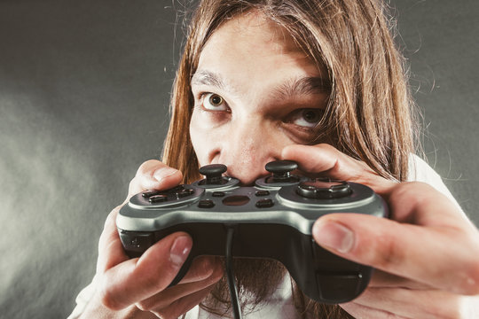 Male player focus on play games