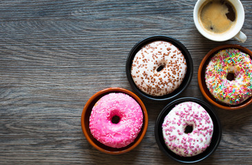 Morning breakfast with colorful Donuts and coffee
