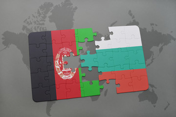 puzzle with the national flag of afghanistan and bulgaria on a world map background.