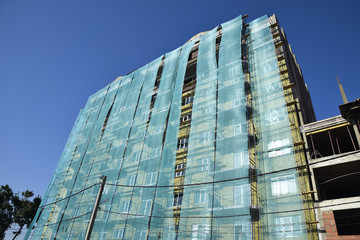 Fototapeta premium Safety net in the newly built high-rise building