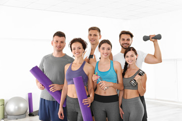 Sport concept. Group of people in gym