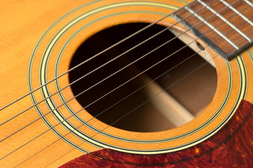 Obraz premium Close up on a classic guitar made of wood