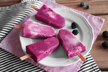 Tasty fruit ice-cream on plate, closeup