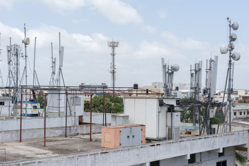 Cellular communications tower  on a roof.