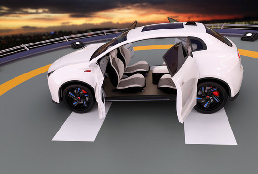 White electric SUV parking on the helipad. The doors opened and front seats rotated to backward. Concept for autonomous vehicle. 3D rendering image.