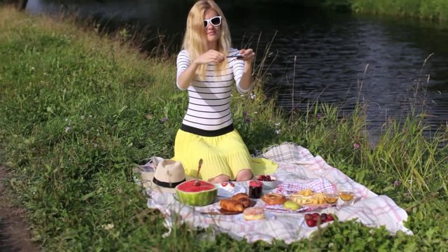 Woman Photographing on Phone Picnic