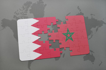 puzzle with the national flag of bahrain and morocco on a world map background.