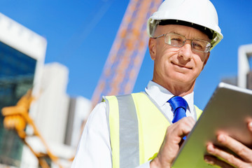 Engineer builder at construction site