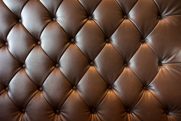 Luxury brown leather texture with buttoned pattern