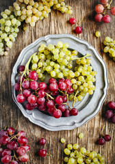 Fresh grapes on vintage plate
