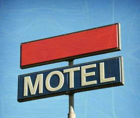 Fototapeta premium aged and worn vintage motel sign