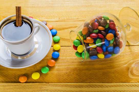 cup of coffee with candies