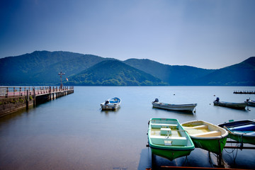 Fototapeta na wymiar Motorboats on a lake
