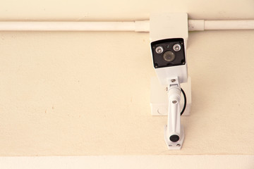 CCTV camera. Security camera on the wall. Private property prote