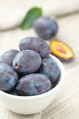Ripe plums in the bowl