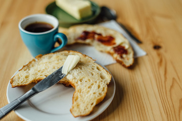 Breakfast with coffee and croissant