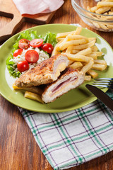 Cutlet Cordon Bleu with pork loin served with French fries and s
