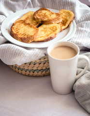 delicious Breakfast in bed with a big sword coffee