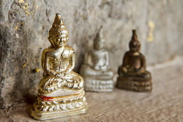 Very small plastic statue of the Buddha