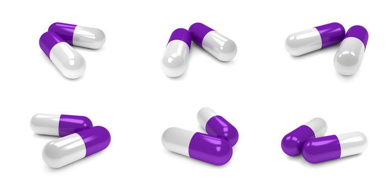 Purple pills capsules isolated on white background.