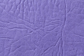 Purple leather texture background with pattern, closeup.