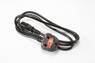 UK power plug isolated on white background.