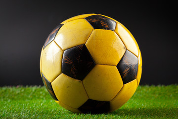 soccer ball on the green field