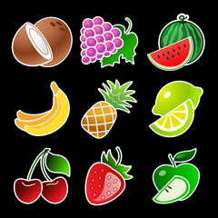 Colorful fruit set on black background