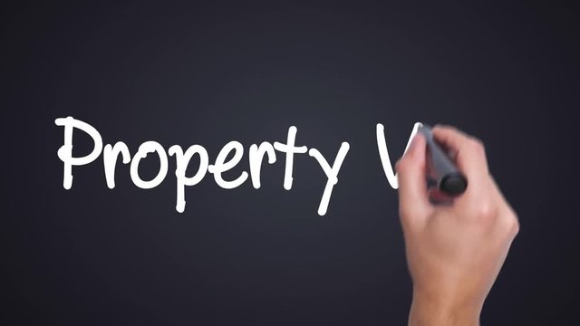 Property Value -  concept with hand writing. Man writing.Words red circled. Business, technology, internet concept. Film look. 4k