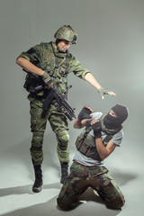 Russian soldier fighting against a terrorist