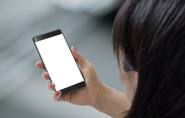 Smart phone in woman hand. Side perspective. Isolated blank display of phone.