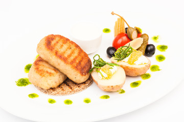 Pike cutlets with garnish