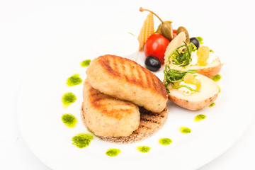 Pike cutlets with garnish