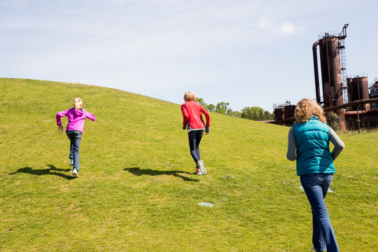 Three girls running