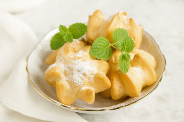 profiteroles with cream and powdered sugar