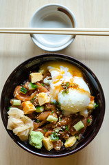 Japanese traditional dish Gyudon made from thinly sliced beef, o