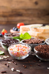 Assorted dutch hagelslag sprinkles. Netherlands traditional sweets for breakfast. Copy space.