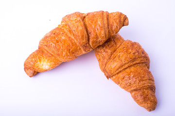 fresh croissant on white background