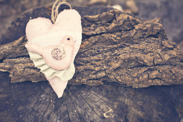 Hand-made hearts  on the old board