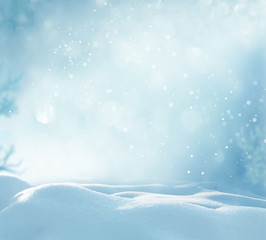 Christmas winter background with snow and blurred bokeh