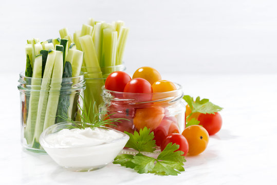 healthy snacks, mixed fresh vegetables and yogurt 