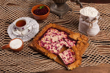 Fototapeta na wymiar Pie on the table with food set