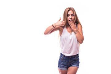 Young happy charming girl  with gesture on white background.