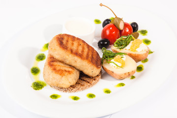 Pike cutlets with garnish