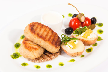 Pike cutlets with garnish