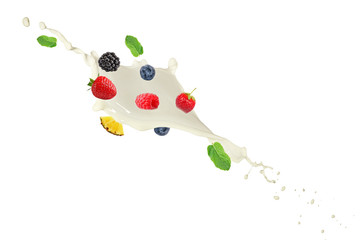 Milk splash with falling fresh tasty fruits isolated on white