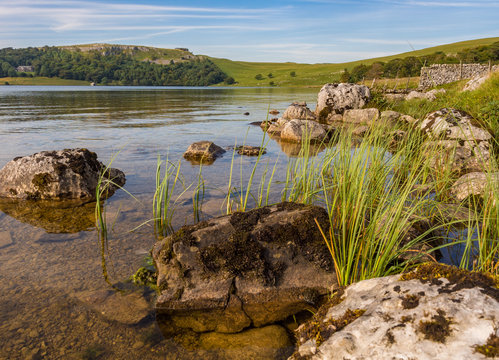 Malham tarn looking beautiuful on a summers evening, Malham, Yorkshire, UK