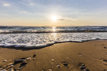 Sunrise on the beach, Rafina town, Greece