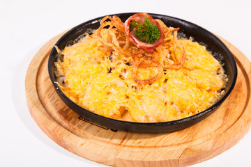 fried potatoes with cheese and meat