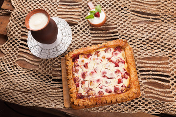 Pie on the table with food set